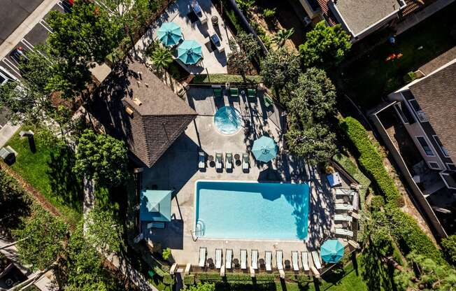 a view of the pool from above  the pool is surrounded