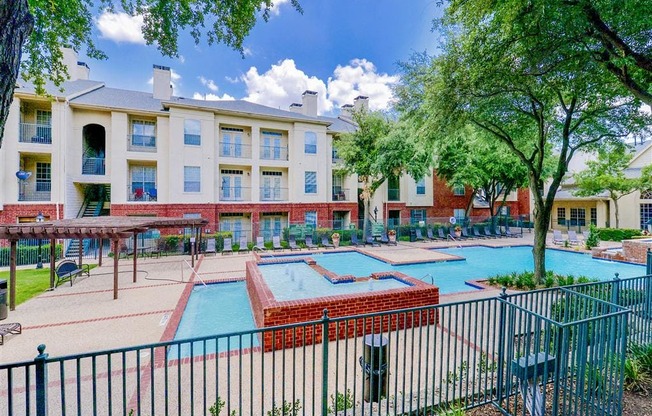 Hot tub and huge resort style pool at Montfort Place in North Dallas, TX, For Rent. Now leasing 1 and 2 bedroom apartments.