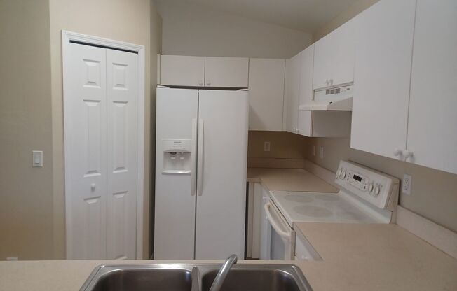PRICE REDUCTION: Freshly Painted: 3 bedroom 2 bathroom single family home with screened lanai
