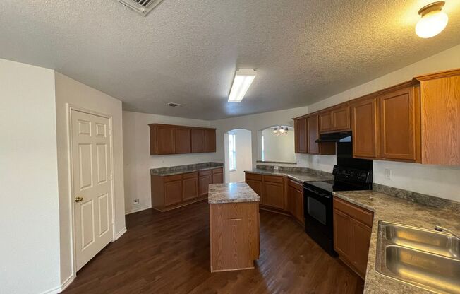 LOTS OF SQUARE FOOTAGE IN THIS 4 BEDROOM HOME FEATURING OVER 3,000 SQUARE FEET & AN ISLAND KITCHEN*NICE OPEN FLOOR PLAN*CENTRAL HVAC*STOVE/RANGE & DISHWASHER INCLUDED*COVERED PATIO*EASY ACCESS TO LACKLAND AFB, SHOPPING, SEA WORLD, FIESTA TEXAS, LA CANTERA