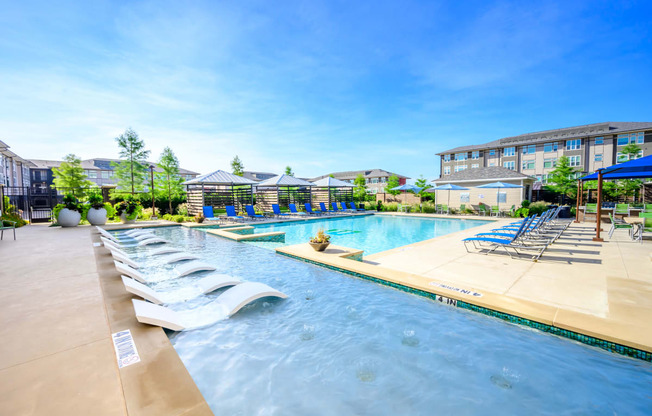 Harmony Luxury Apartments pool and entertainment area Apartments for rent Rowlett, TX 75089