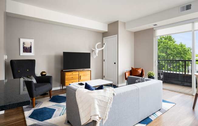 a living room with a couch and a tv