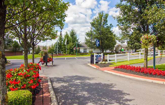 a street with a red bike parked on the side of a road