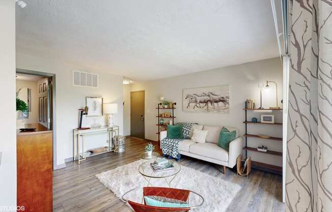 a living room with a couch and a table