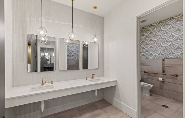 Bathroom with two sinks and three mirrors at Hadley Place Apartments, Pennsylvania, 17025