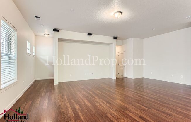 **New Lower Price** Charming 3-Bedroom Open Concept Condo!