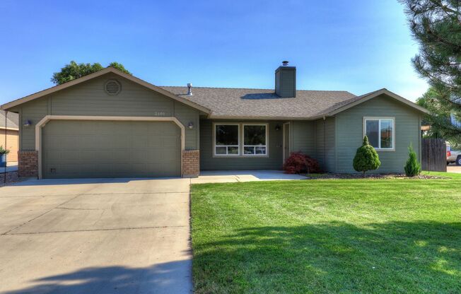 4 Bedroom 2 Bath with RV Parking 2 Car Garage and Large Storage Shed