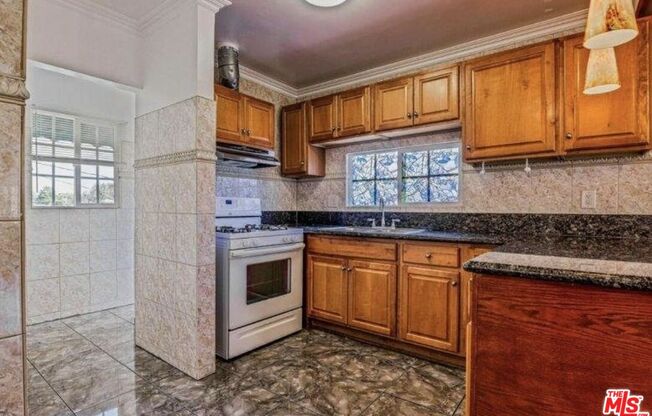 110 S ALEXANDRIA AVE
