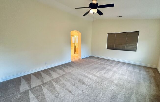 Rhodes Ranch guard gated golf course community home with a bedroom & full bath downstairs!