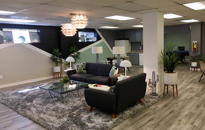 a living room filled with furniture and a flat screen tv