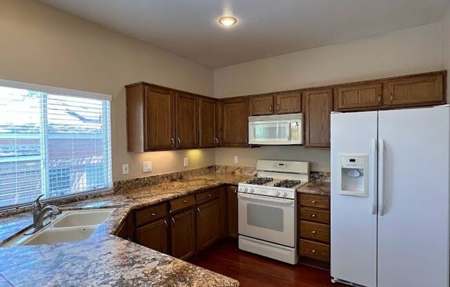 Perfect home in the heart of Summerlin with vinyl plank flooring throughout the rooms!! This charming 1-story residence offers the ideal blend of comfort, convenience, and style. Boasting 3 bedrooms and 2 bathrooms, close to Red Rock Casino and Canyon Poi