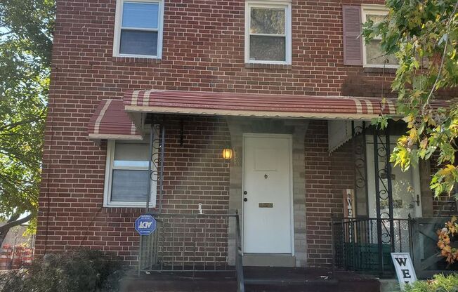 3 Bed, 1 Bath Townhouse with Fenced Yard, Hardwood Floors, and Fireplace