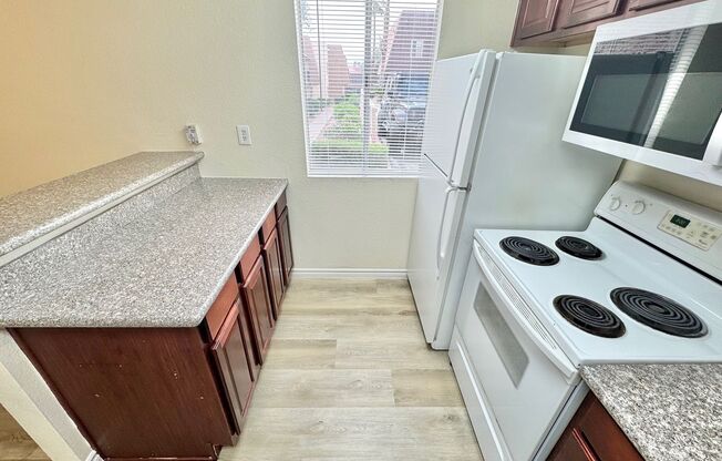 Stylish condo with new upgrades, tennis courts, and pool access