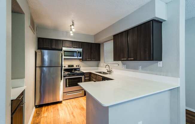 updated kitchen with stainless steel appliances