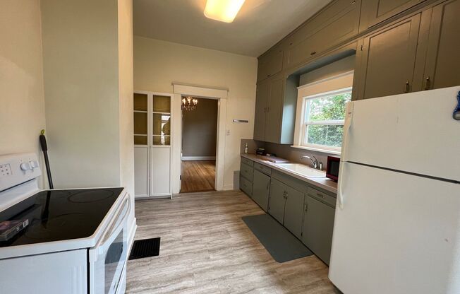 3807 NE Cleveland Avenue ~ Elegant Vintage Home!