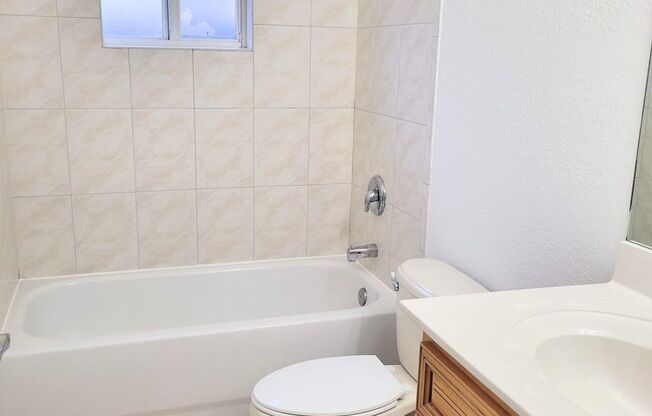 Single-story, 3/2.5 corner lot located near multiple FL Turnpike exits