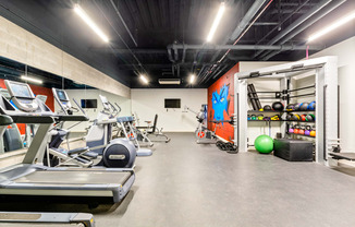 State-of-the-art fitness center with modern exercise equipment and ample space for workouts