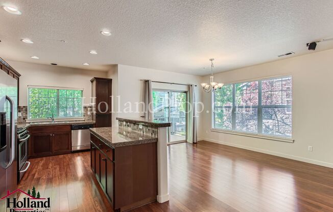 **New Lower Price** Charming 3-Bedroom Open Concept Condo!