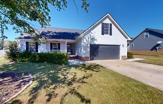 Charming 3-Bedroom Home with Bonus Room, Detached Garage & Modern Upgrades in Raeford, NC