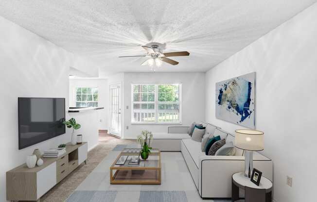 a living room with white walls and a white couch