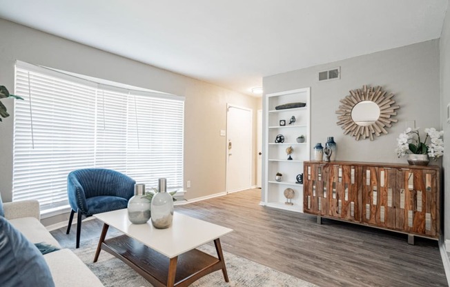 a living room with a couch and a coffee table