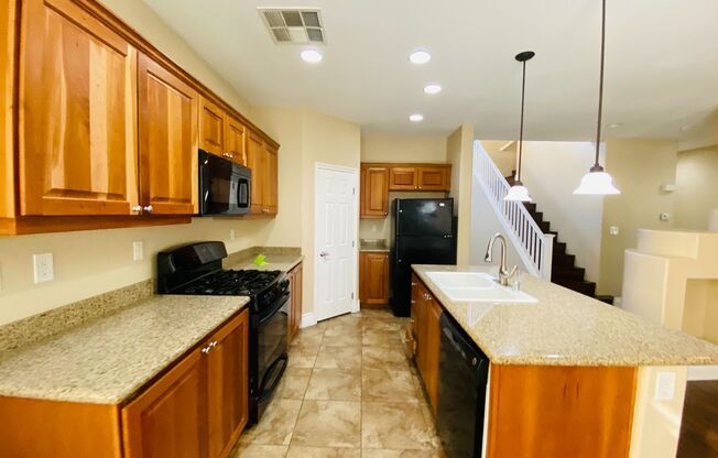 Beautiful & large Rhodes Ranch guard gated community 4 bedroom home with the master bedroom downstairs and a big loft upstairs! With a covered backyard patio. Community features pool, spa, gym, and parks!
