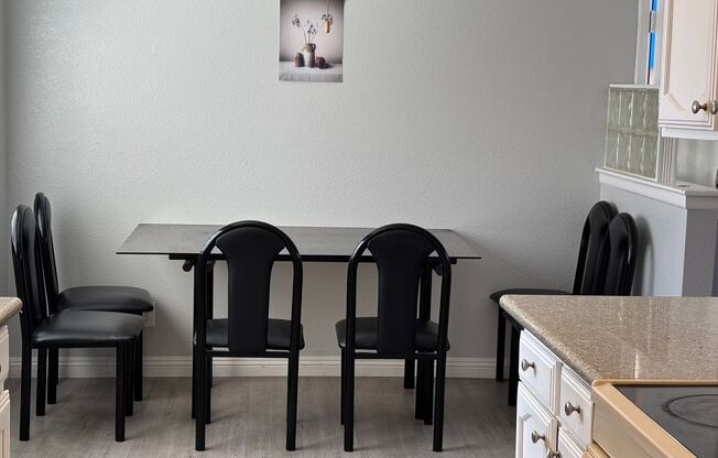 Partially furnished Cozy second-floor condo in a gated Southwest community 2 bedrms+2baths