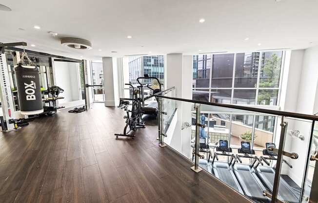 A gym with a view of the city.
