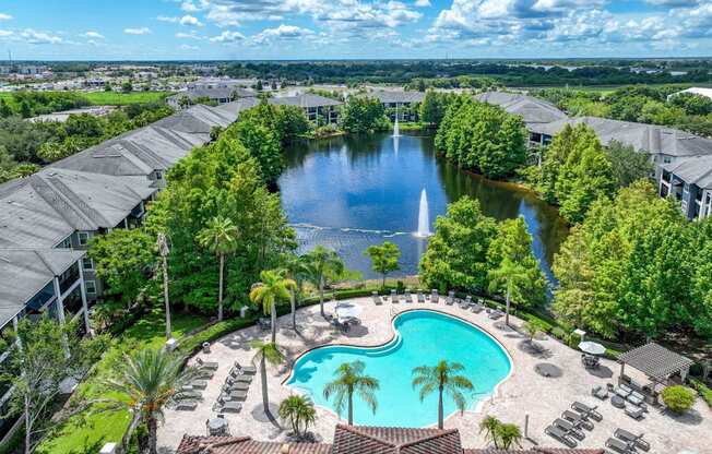 An ariel view of the pool and pond at Verano apartments