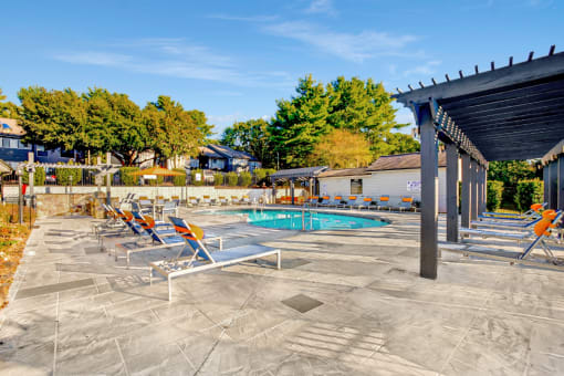 Poolside Sundeck With Relaxing Chairs at Edgemont  Apartments, PRG Real Estate, Greenville, SC