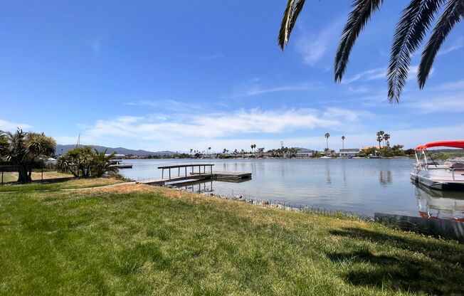 WATERFRONT HOME IN BEL MARIN KEYS WITH BOAT DOCK, FENCED YARD.