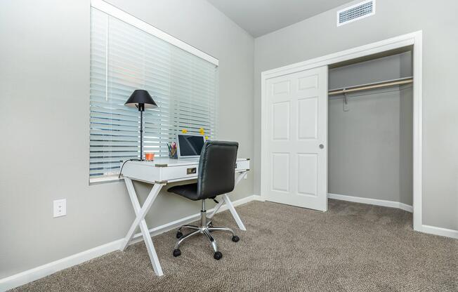 a chair sitting in front of a door