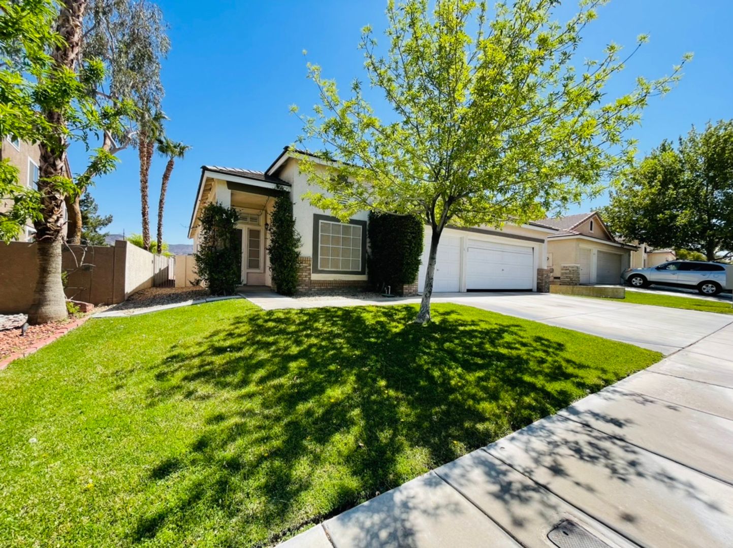 Single-story 4 Bed nestled in the desirable Green Valley Ranch!  3 Car Garage!