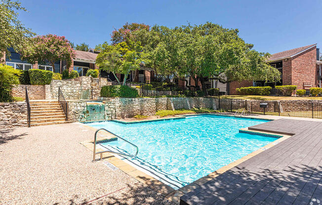 our apartments showcase a swimming pool at Sunset Canyon, San Antonio, TX