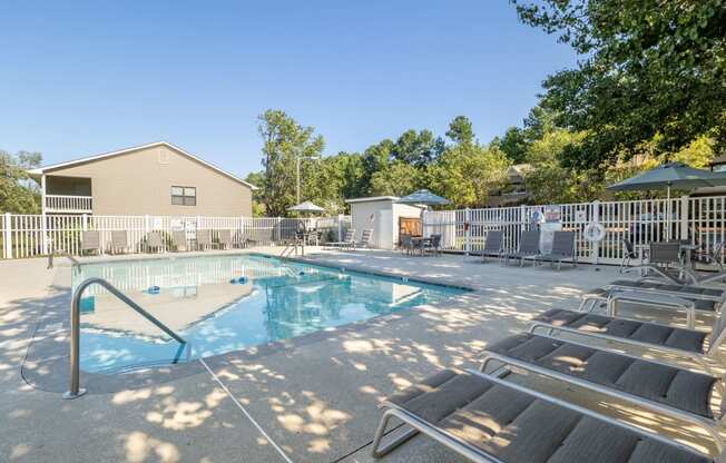 our resort style swimming pool is next to our buildings and has lounge chairs