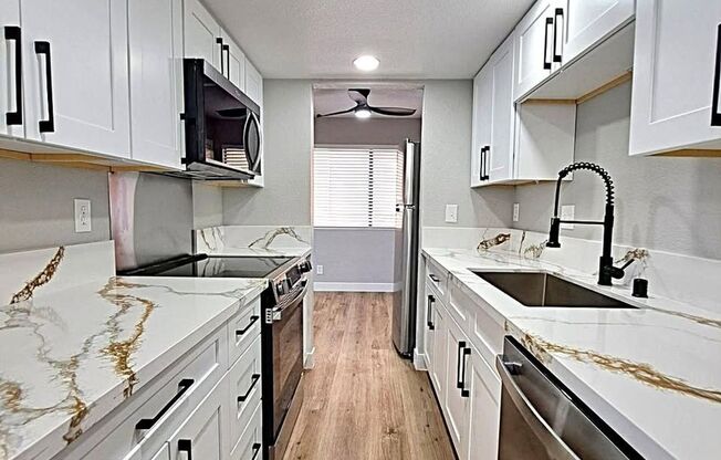 NEWLY RENOVATED & MODENIZED 2ND FLOOR CONDO IN SPRING VALLEY