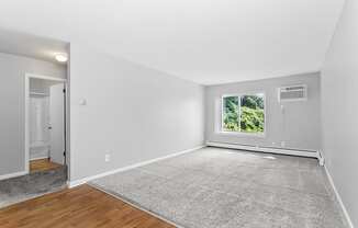 an empty living room at Eagle Pointe New London, CT, 06320