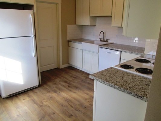 *Updated*Granite*Tile*Hardwoods* 200sf storage* Carport* Mowing Service!