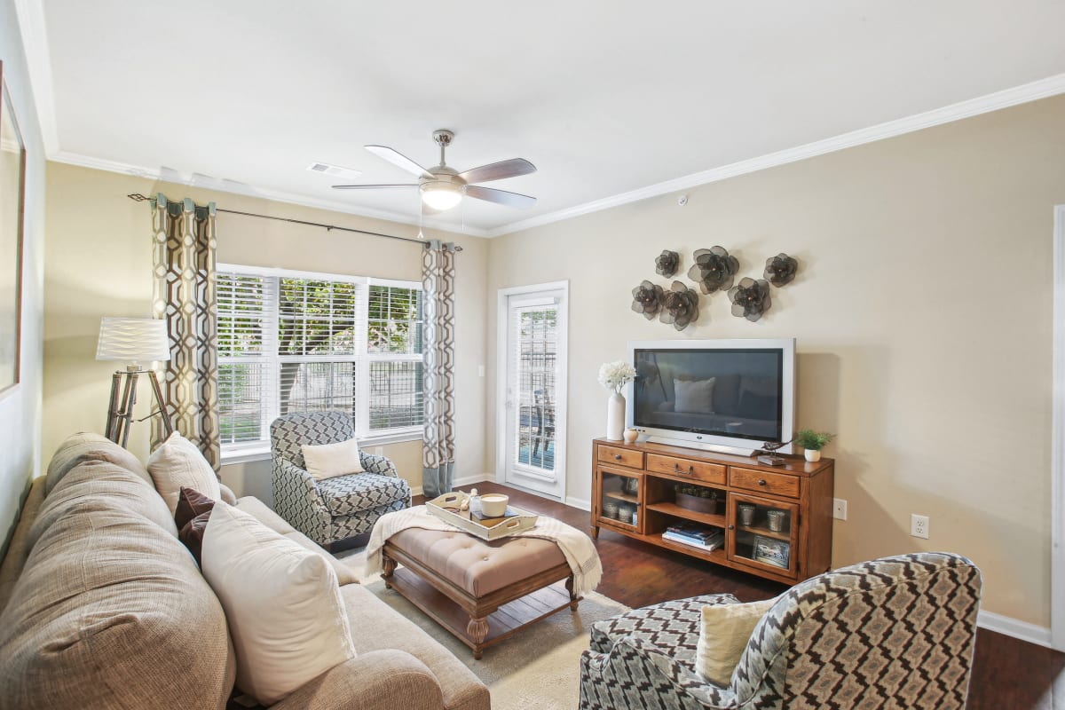 a living room with a couch and a tv