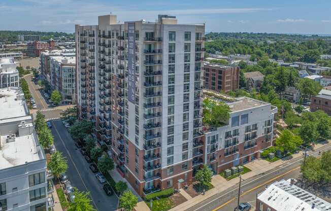 an aerial view of an apartment building in a city