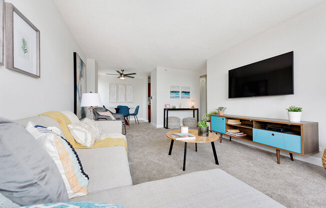 a living room with a couch and a tv
