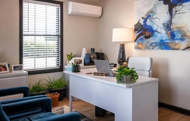 an office with a desk and a laptop on it at Cleo Apartments, Athens, 35611
