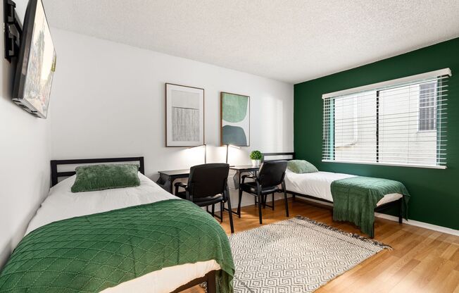 A fully furnished 5 bedroom, 2 bathroom apartment with common areas at 1823 Pelham Ave. Unit 8