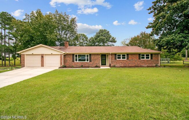 s: Brick single story ranch, 3 bedrooms 2 bathrooms and lots of space for entertaining.