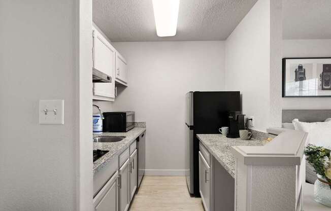 our apartments offer a kitchen with stainless steel appliances and granite counter tops