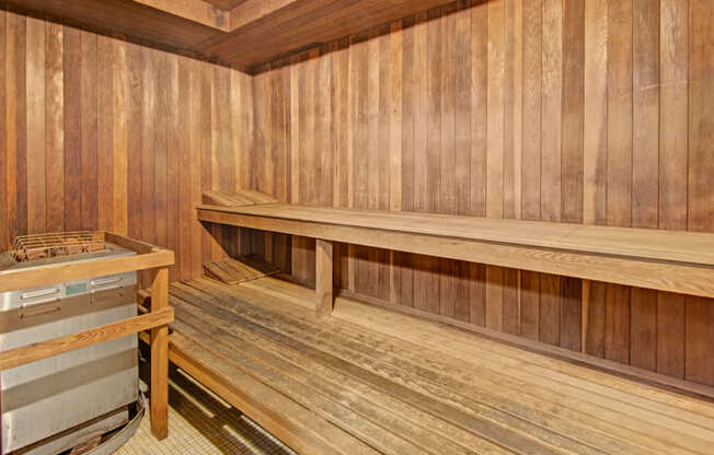 A relaxing sauna here at Watercrest with warm wood-paneled walls and tiered bench seating, offering a peaceful and rejuvenating community amenity for resident wellness.