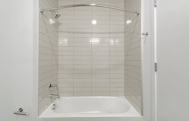 Bathrooms featuring quartz countertops extra storage and space at Pinnacle Heights Apartments at Rogers, Arkansas.