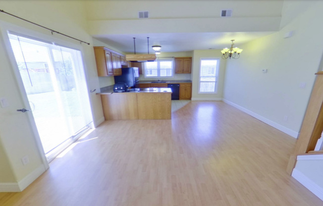 Gorgeous West Side Town Home with 2 Car Garage + Vaulted ceilings! Available July 25th!