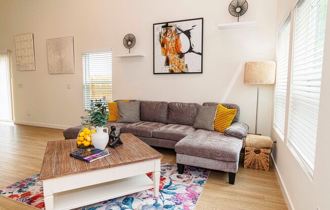 Spacious 3BR/3BA home in a quiet neighborhood near downtown and beaches, featuring private baths, outdoor seating areas, fenced yard, and modern comforts—perfect for short or long-term stays.