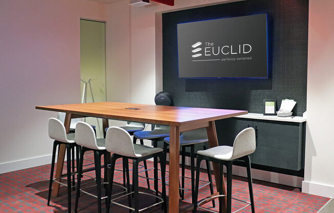 Euclid leasing office conference table with TV